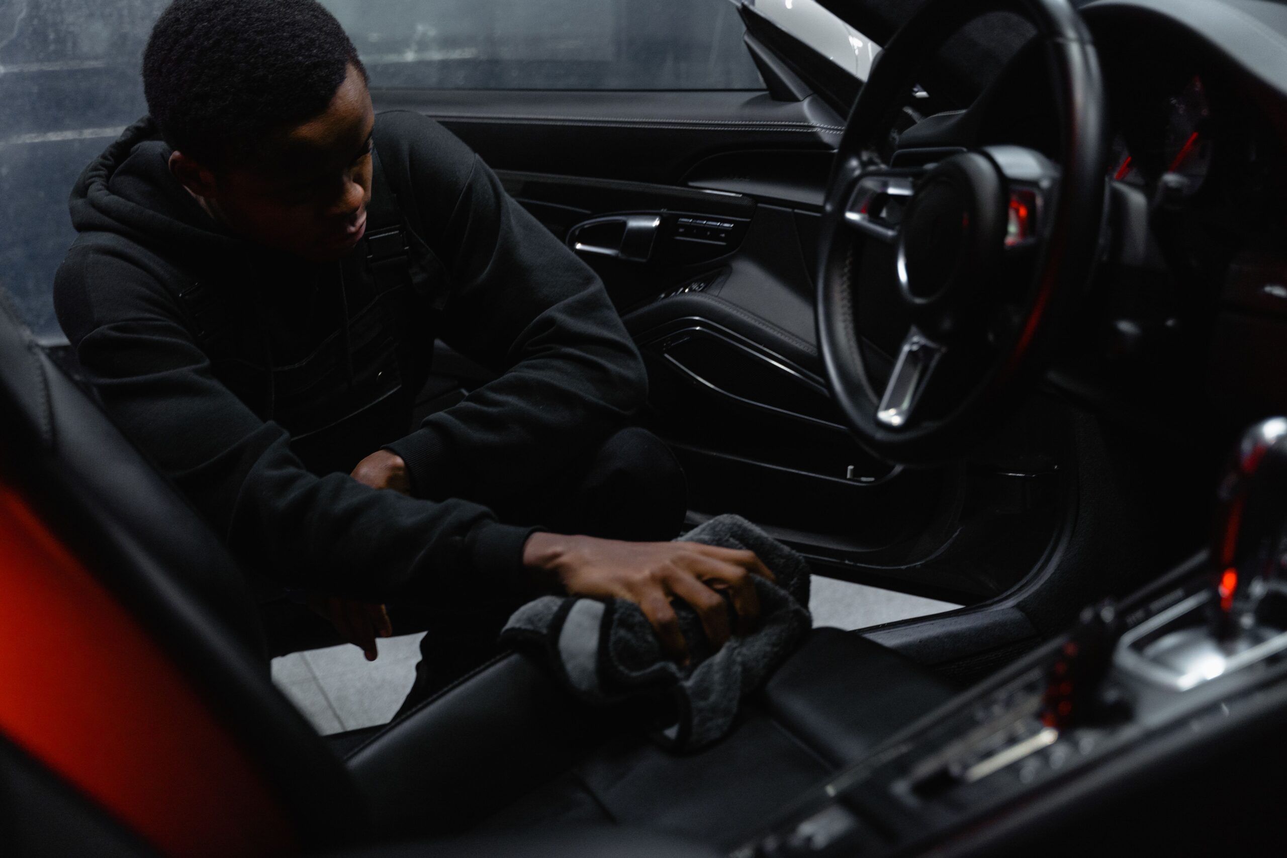 Professional car cleaning in Norwich with interior seats being carefully cleaned